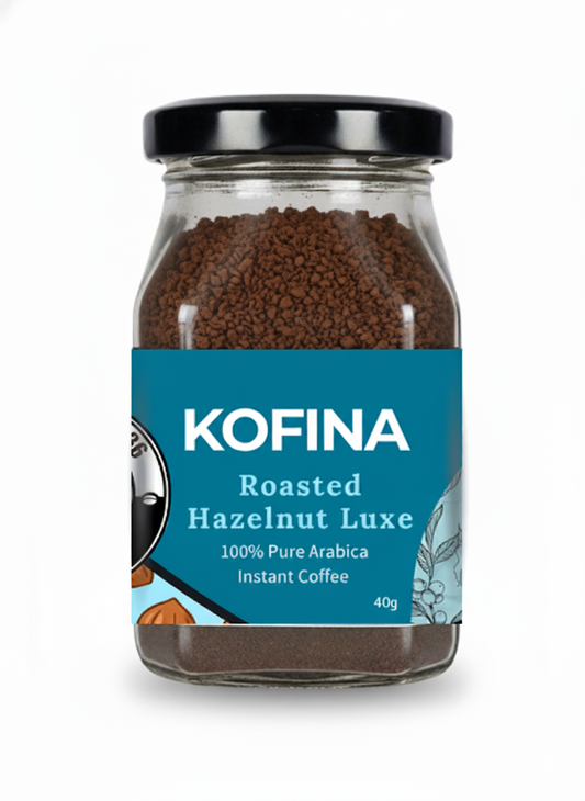 Kofina Roasted Hazelnut Luxe – premium instant coffee with smooth roasted hazelnut flavour, crafted from 100% pure Arabica beans for a nutty, aromatic brew.